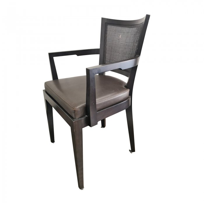 Two Design Lovers eight cane back dining chairs angle view of carver