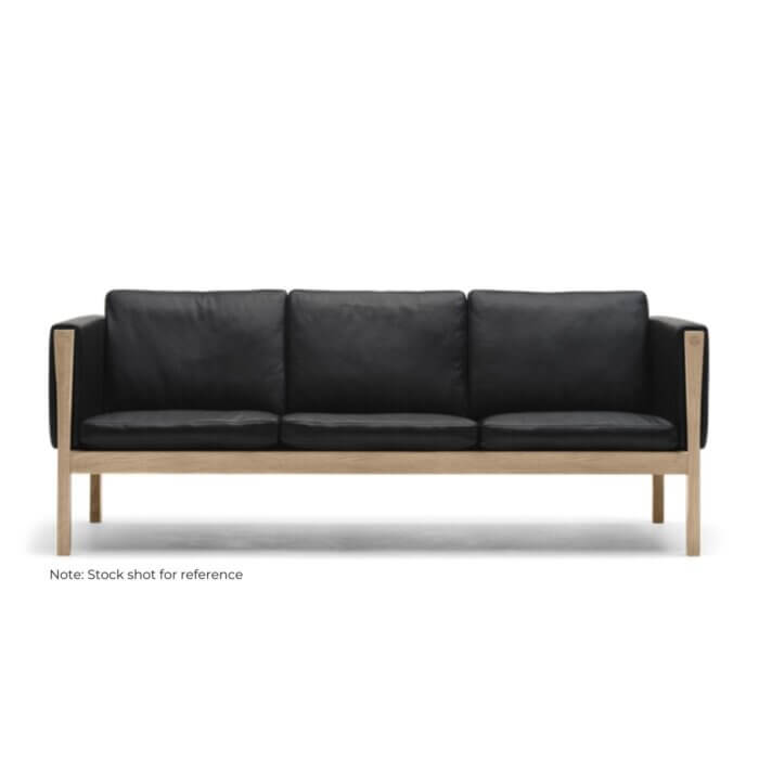 Two Design Lovers. Hans Wegner CH163 3 seater sofa in black leather