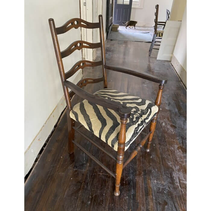 Antique chairs with zebra seat