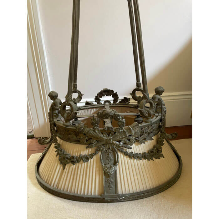 Antique French pendant light in cast metal with cherubs and vines