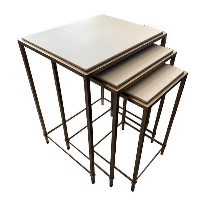 Two-Design-Lovers-Cavit-&-Co-Cream-Leather-and-Brass-Side-Tables-nest